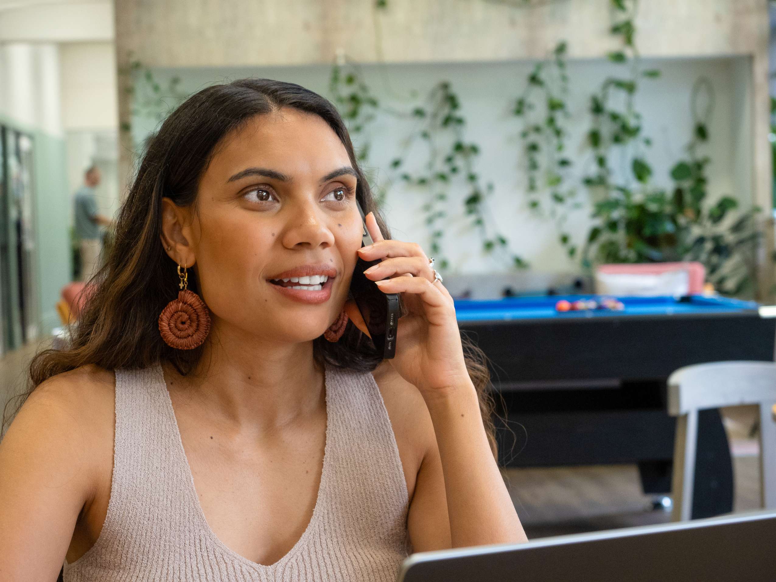 Consultant on phone in office environment